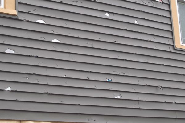 Damaged Siding Replacement in Nashua